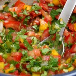 A mild spicy salsa with red and green peppers for crab cakes.